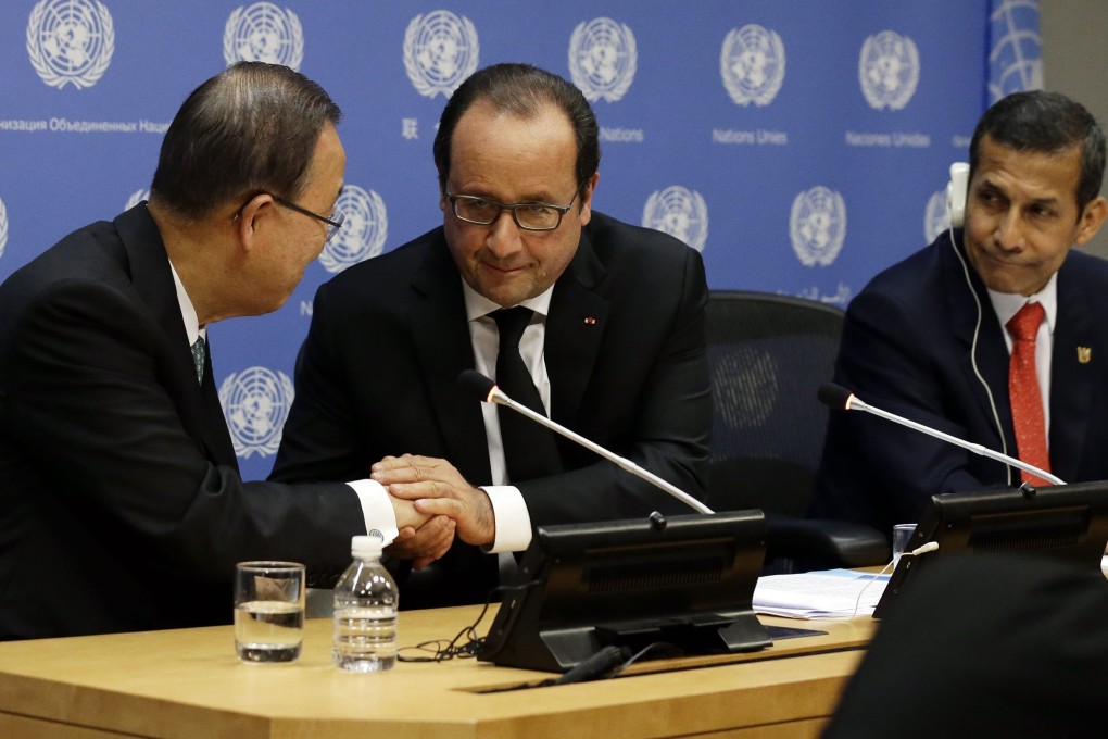 UN Secretary General Ban Ki-moon (left), French President Francois Hollande and Peruvian President Ollanta Humala attend a press conference on Sunday on the sidelines of their climate change meeting in New York. Photo: EPA