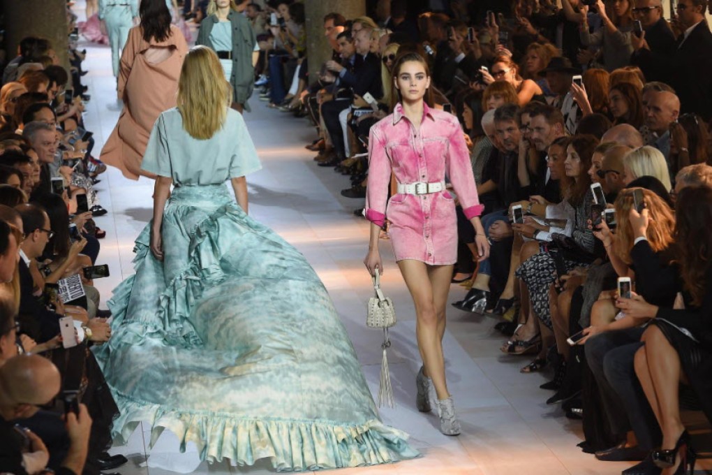 Models present looks from the Roberto Cavalli spring/summer 2016 collection in Milan. Photo: EPA