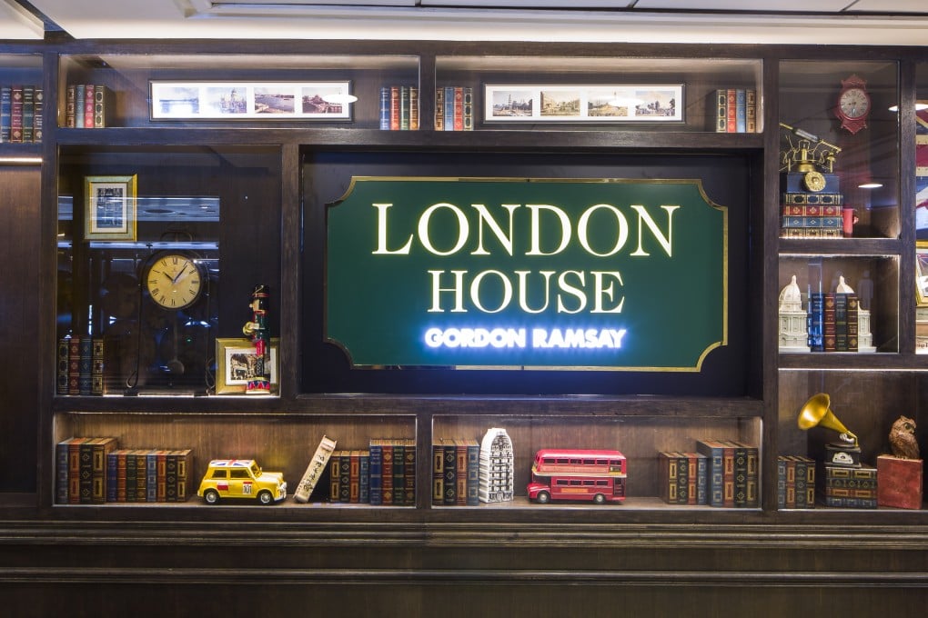 With wooden floors and dark wood panelling, London House evokes a British pub.