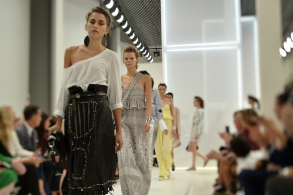 Models present looks from Tod's spring/summer 2016 collection in Milan. Photo: AFP