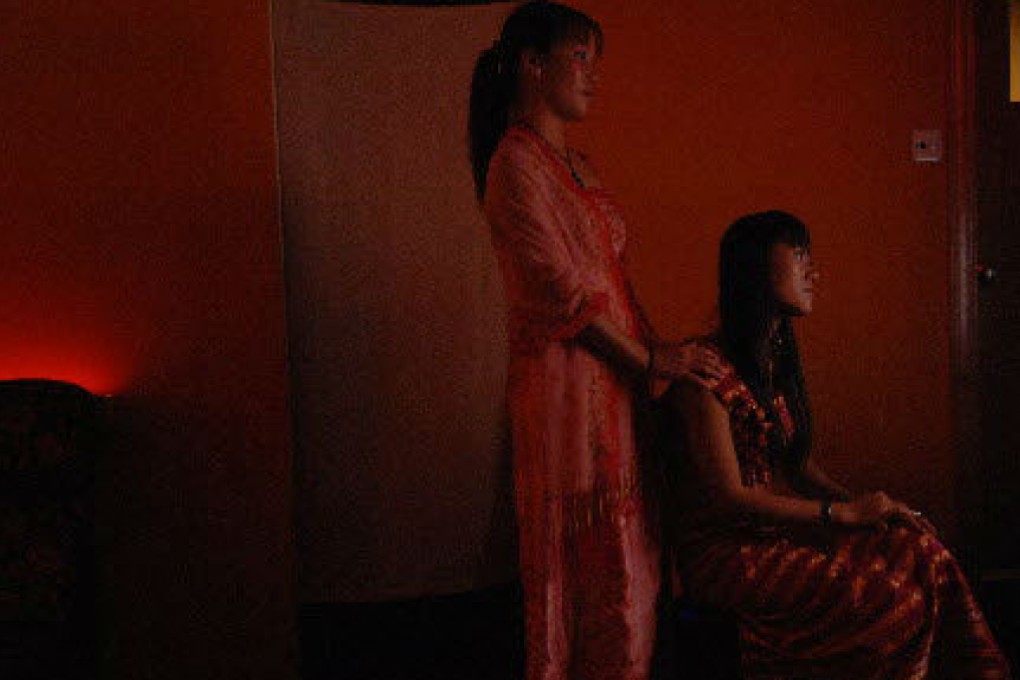 Alleged prostitutes detained by police in Shanghai reportedly charged clients up to 10,000 yuan for sexual services. File photo: Sinopix