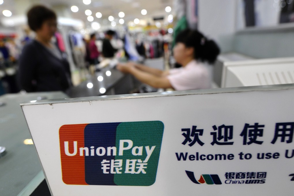 Chinese bank card operator UnionPay is seen at a cashier at a shopping mall in Changzhi, Shanxi province. Photo: Reuters
