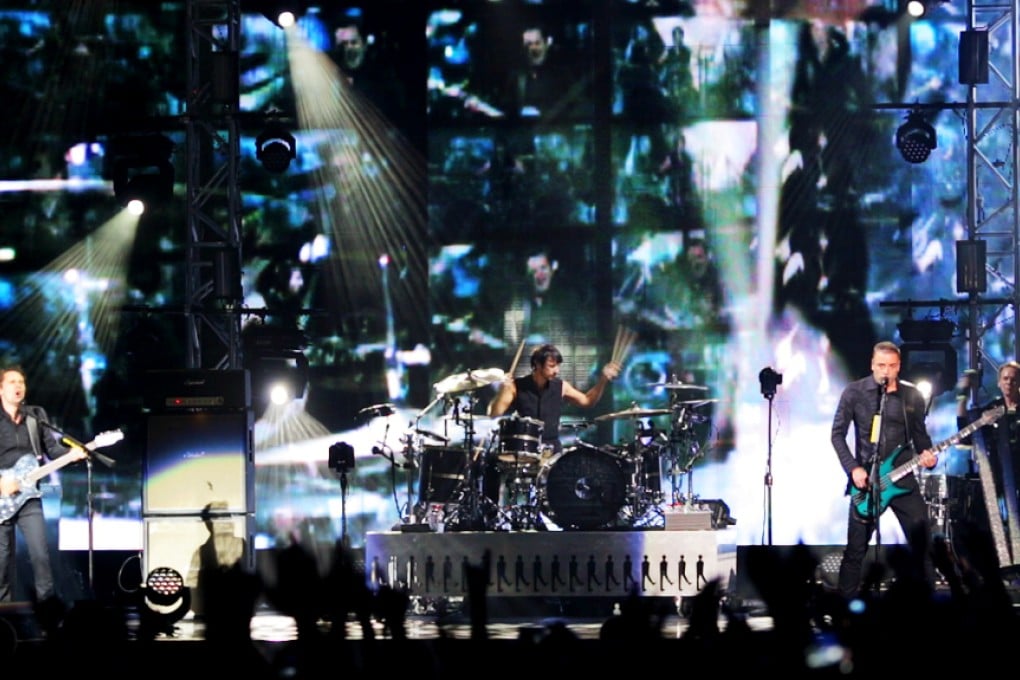 Muse take to the stage at AsiaWorld-Expo on September 28, 2015. Photo: Robin Fall/SCMP