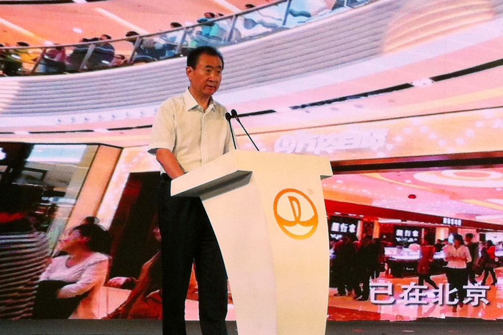 Wang Jianlin, chairman of Dalian Wanda Group, delivers a speech on Saturday during a signing ceremony for the company to invest 95 billion yuan in Yunnan province. Photo: Langi Chiang