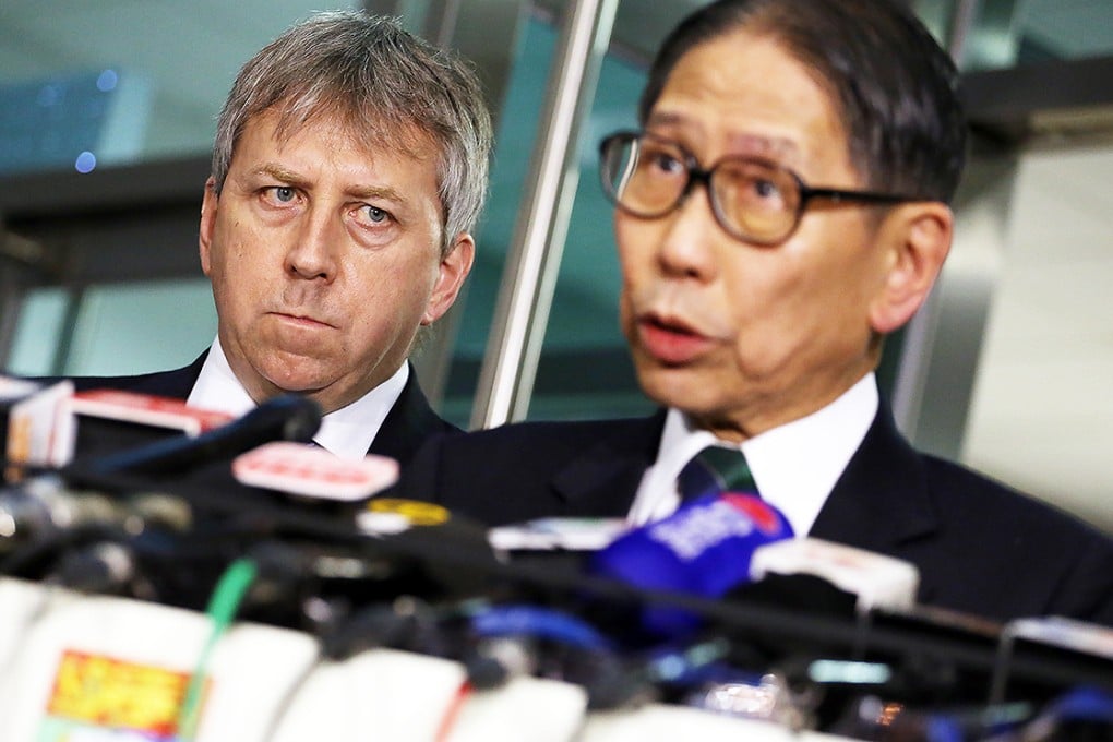 HKU vice-chancellor Professor Peter Mathieson (left) and HKU Council chairman Dr Leong Che-hung announce the decision. Photo: Felix Wong