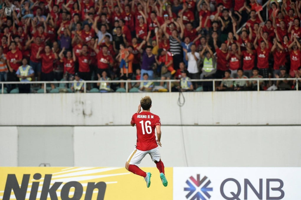 Huang Bowen celebrates netting Guangzhou Evergrande's equaliser in their 2-1 win over Gamba Osaka in an AFC Champions League semi-final first leg. Photos: Xinhua