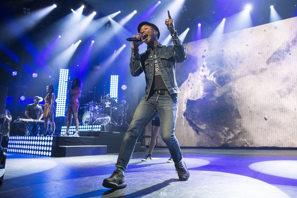 Pharrell Williams performs on stage during the Apple iTunes Music Festival at the Roundhouse in Camden, north London last week. Photo: AP