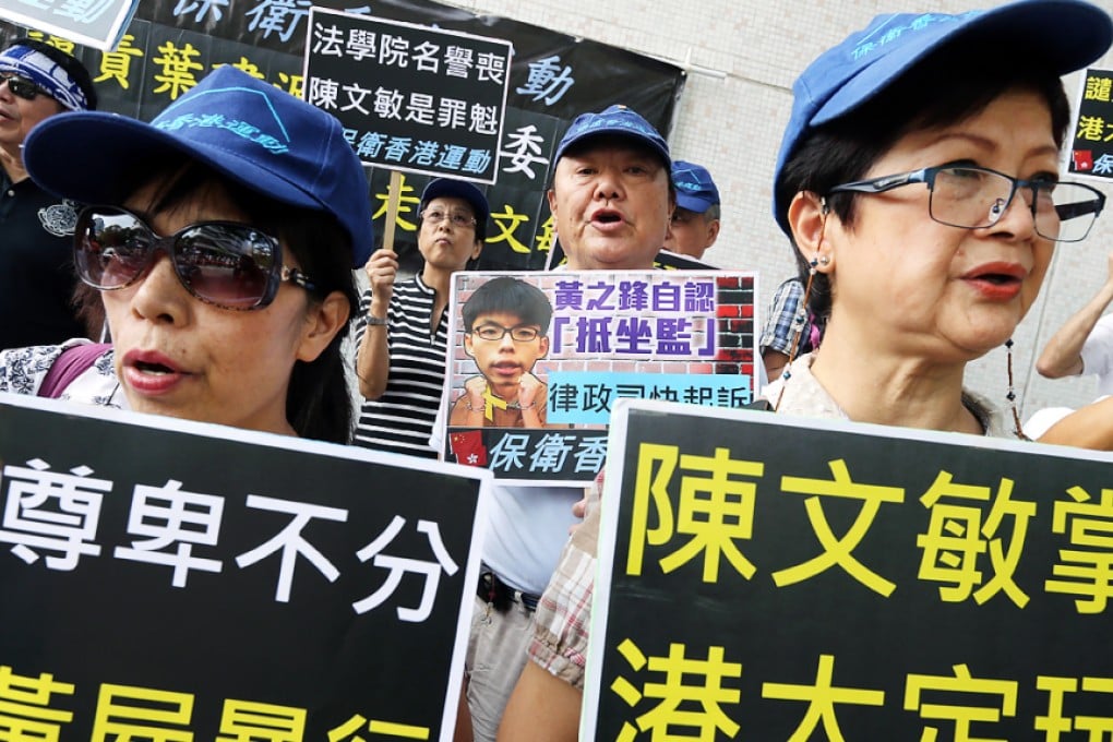 Opponents to Johannes Chan's appointment make their views known at the HKU campus in Pok Fu Lam ahead of the university council's vote. Photo: Felix Wong