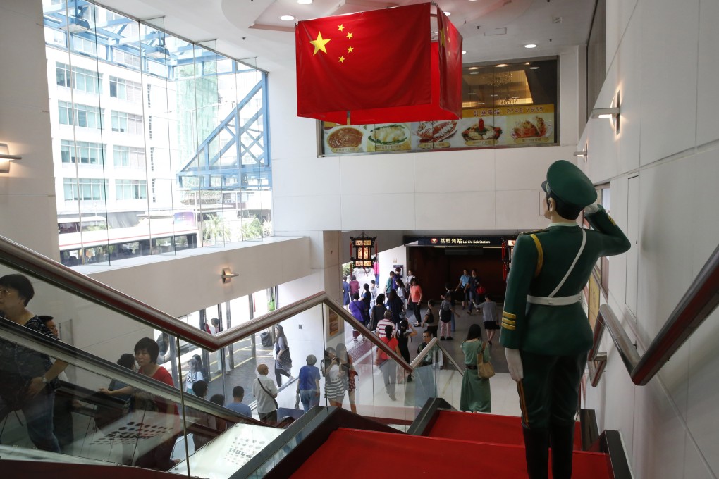A statue of a People's Liberation Army officer is displayed in a Hong Kong shopping centre ahead of the National Day on October 1. Photo: AP
