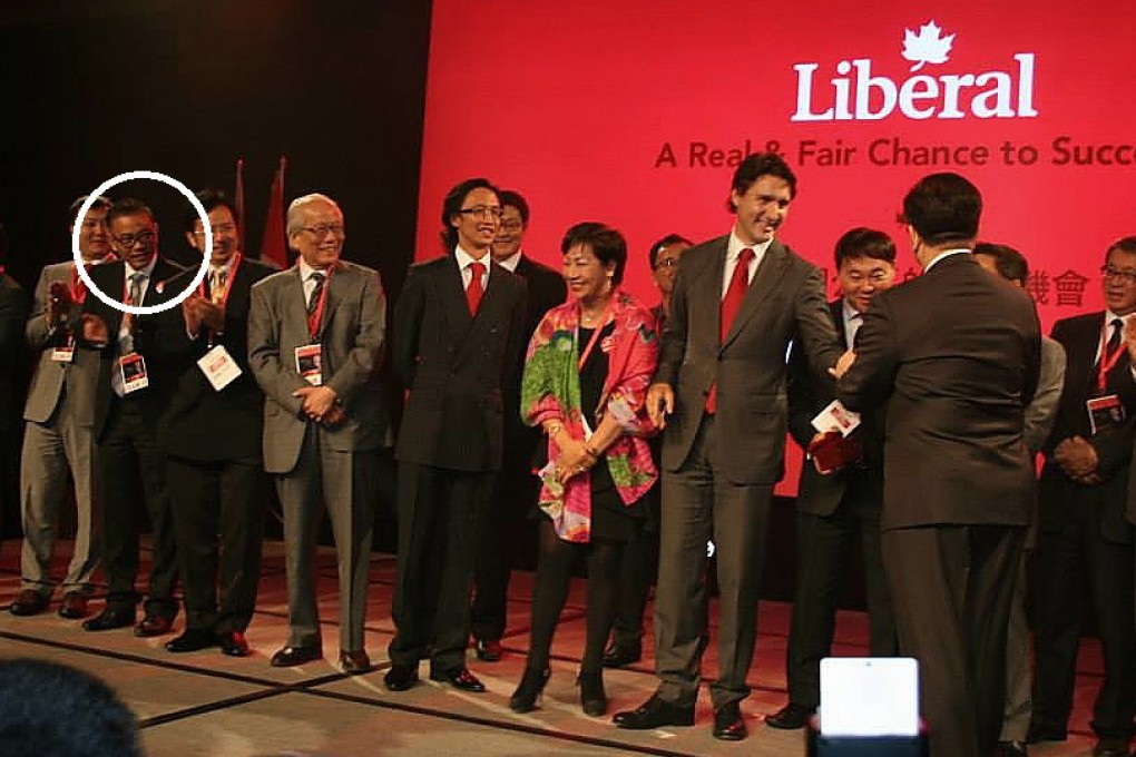 Chinese graft suspect Michael Ching (circled) looks on as Liberal leader Justin Trudeau receives a presentation at a June 15, 2014, gala at the Toronto Sheraton Centre Hotel. A pro-Trudeau group based in Ching’s office helped stage the event (others in the photo have no relationship to this group). Photo: Facebook