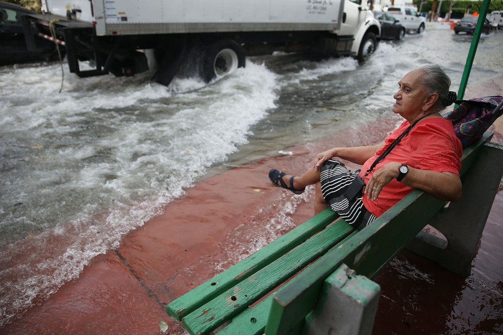 Insurance companies and others could face potentially huge liabilities from severe weather such as floods and drought. Photo: AFP