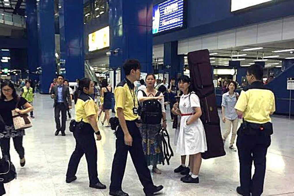 Hong Kong musicians oppose MTR ban on large instruments with one voice