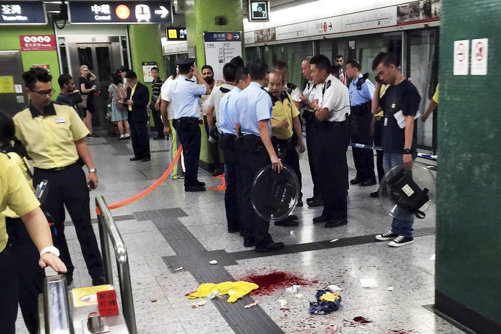 Police at the scene of the attack inside Jordan MTR station. Photo: SCMP Pictures