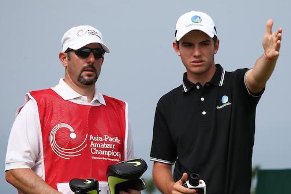 Ryan Ruffels discusses a shot with his caddie. Photos: AAC