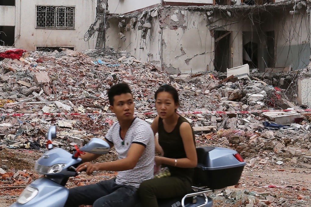 A partially collapsed residential building, which was damaged after a suspected parcel bomb exploded in Liucheng county, in Guangxi Zhuang autonomous region on Wednesday. Photo: Dickson Lee