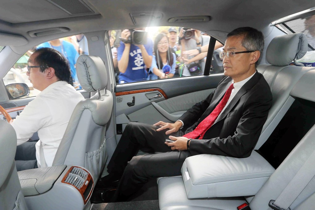 Professor Lo Chung-mau arriving at HKU in August as an alumni group rallied to call on the university's governing body to appoint Dr Johannes Chan. Photo: Felix Wong