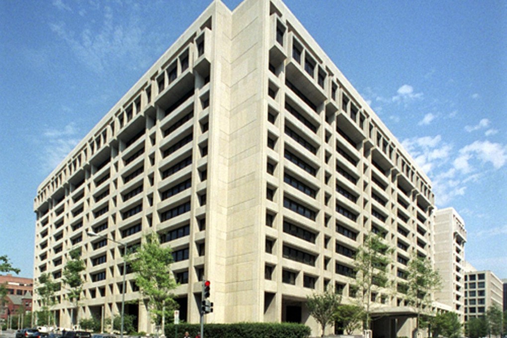 The International Monetary Fund (IMF) headquarters in Washington, DC, as the body said mounting levels of debt could pose a threat to the global economy. Photo: AFP