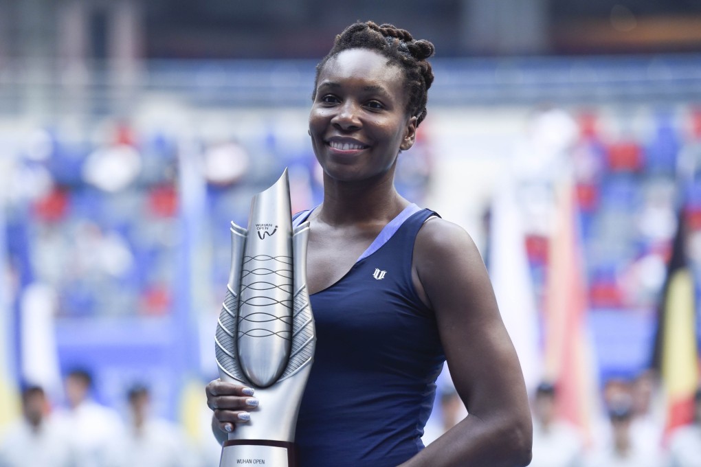 Venus Williams celebrates with the Wuhan Open trophy. Photo: AFP