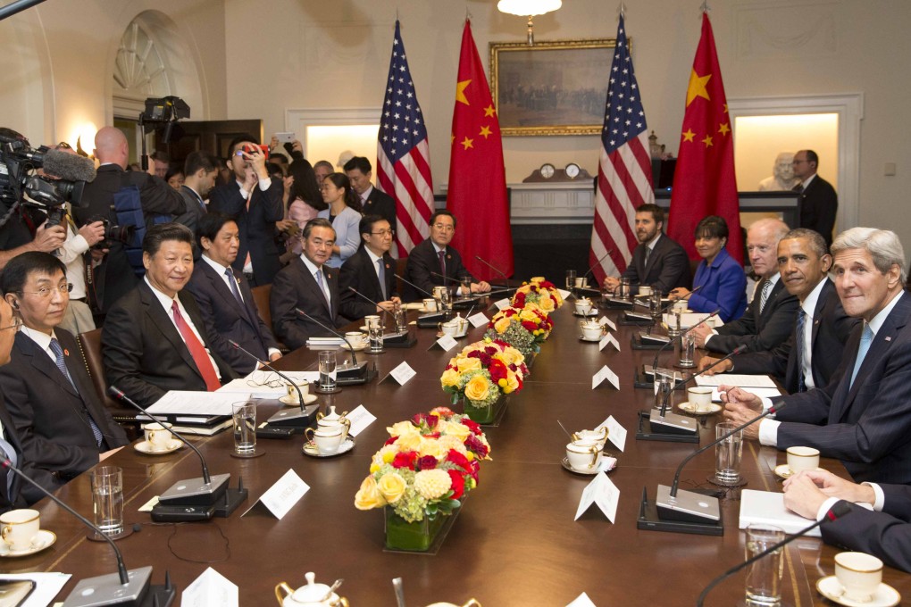 Chinese President Xi Jinping (third left) holds talks with US President Barack Obama (third right) in Washington. Photo: Xinhua