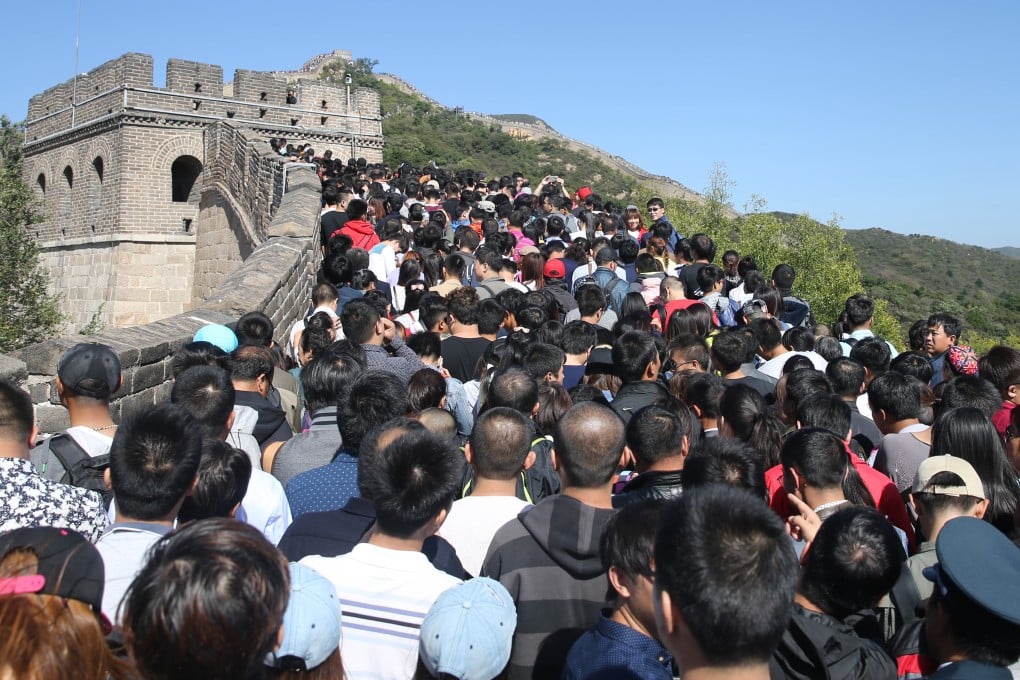 Chinese tourists cram onto the Great Wall in Beijing, on Friday, which was the second day of the week-long National Day holiday. Photo: Xinhua