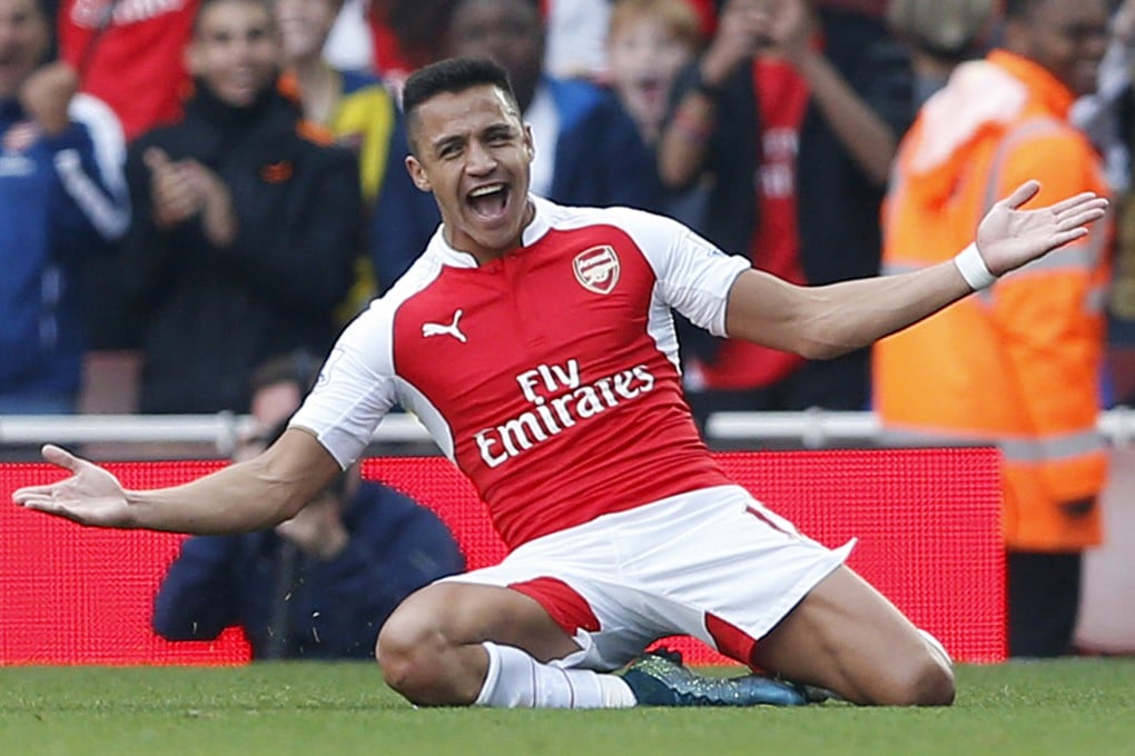 Alexis Sanchez celebrates after scoring his second goal for Arsenal in their 3-0 rout of Manchester United at the Emirates. Photo: Reuters