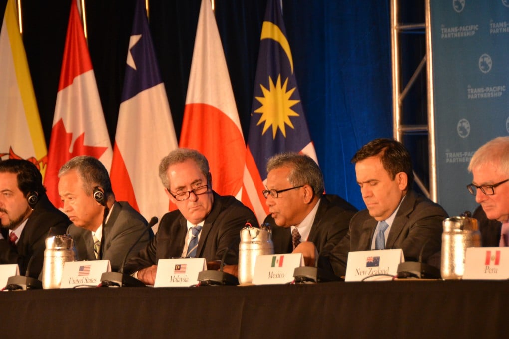 Trade ministers of the United States and 11 other Pacific Rim countries attend a press conference after negotiating the Trans-Pacific Partnership trade agreement in Atlanta. Photo: Xinhua