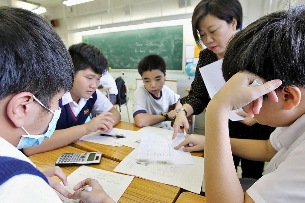 Students and their teacher at San Wui Commercial Society Secondary School. Photos: Franke Tsang
