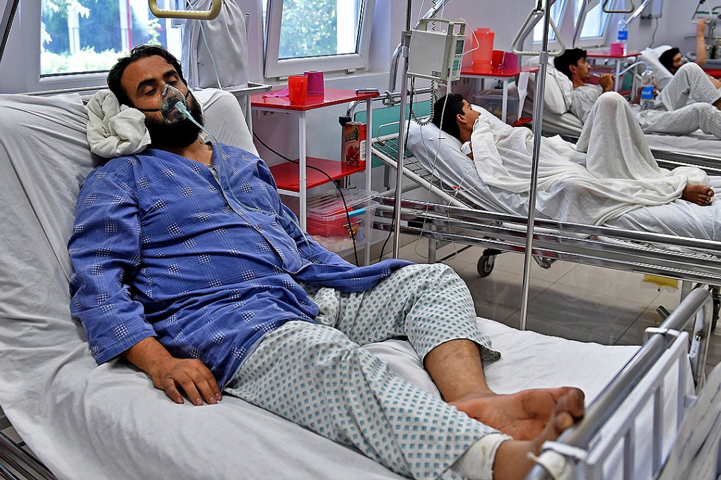 A wounded staff member of Doctors Without Borders (MSF) from the US air strike receives treatment at the Italian aid organization emergency's hospital in Kabul yesterday. Photo: AFP