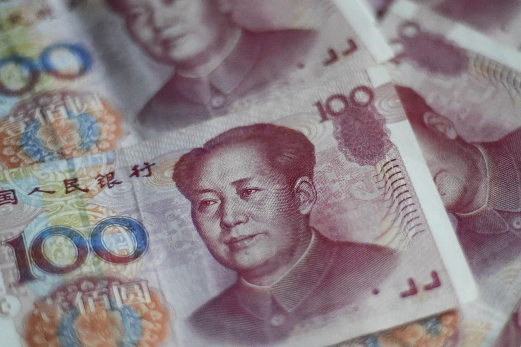Chinese 100-yuan notes as a further fall in the country's forex reserves are expected for September. Photo: AFP