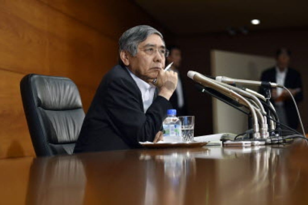 Bank of Japan governor Haruhiko Kuroda said he expected to hit the inflation target around the six months from next April. Photo: EPA
