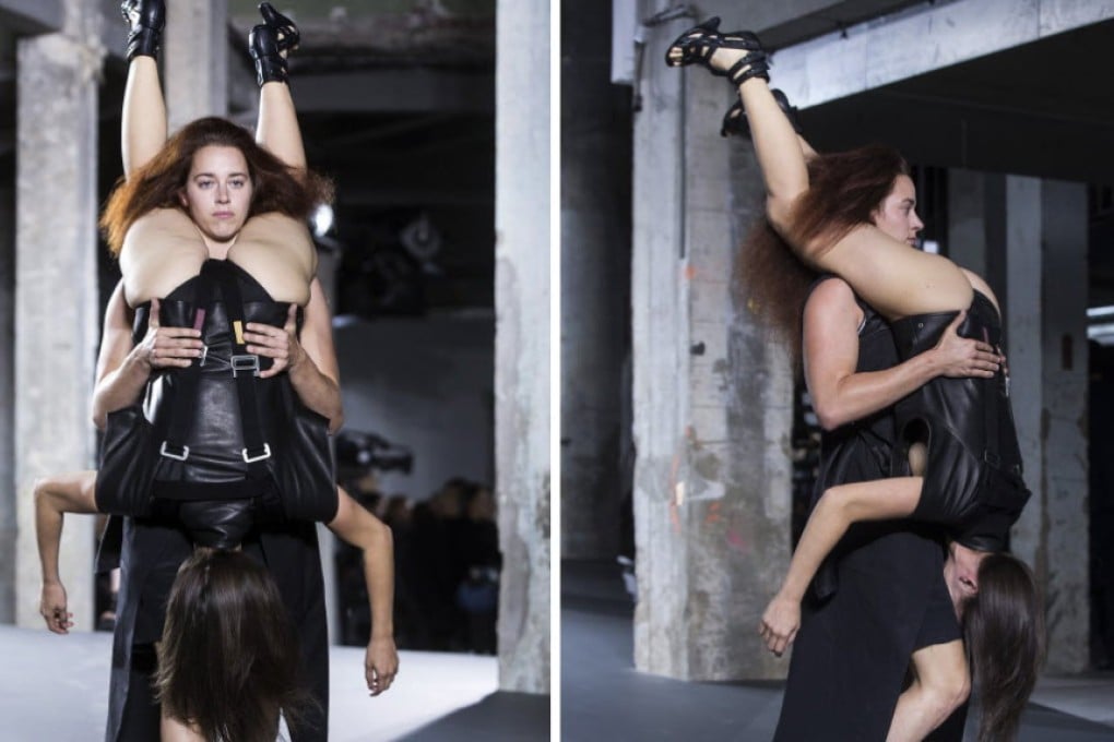 Rick Owens described the straps holding his "human backpack" models in place as "loving ribbons". Photo: EPA