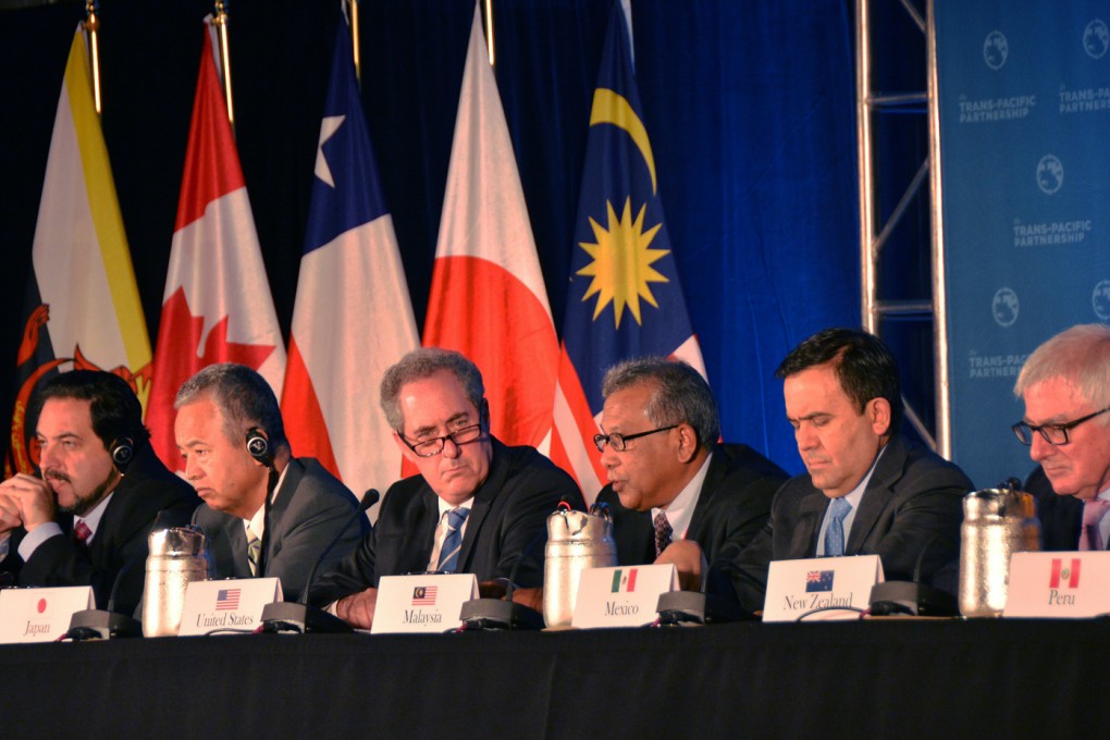 Trade ministers of the United States and 11 other Pacific Rim countries attend a press conference after negotiating the Trans-Pacific Partnership trade agreement in Atlanta. Photo: Xinhua