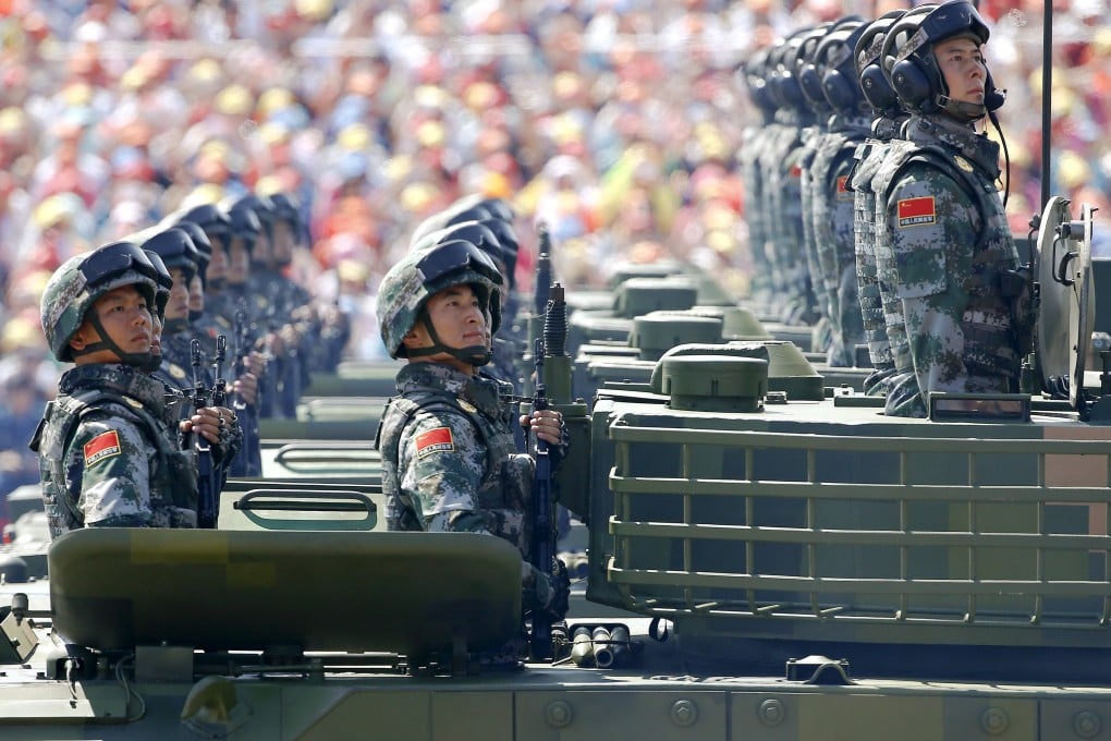 Soldiers of China's People's Liberation Army look towards President Xi Jinping in Beijing's Tiananmen Square during the military parade marking the 70th anniversary of the end of the second world war on September 3. Photo: Reuters