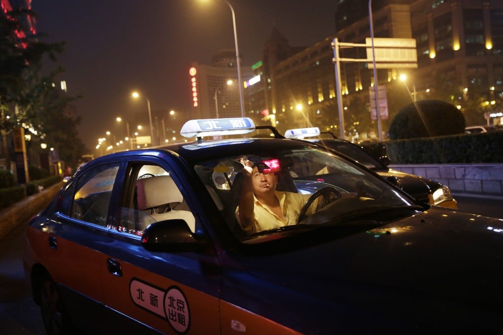Didi Kuaidi controls over 80 per cent of the car-hailing market on the Chinese mainland. The start-up, born of a merger in February between China's top two rival taxi-hailing apps, is now believed to be worth around US$ 16 billion. Photo: EPA