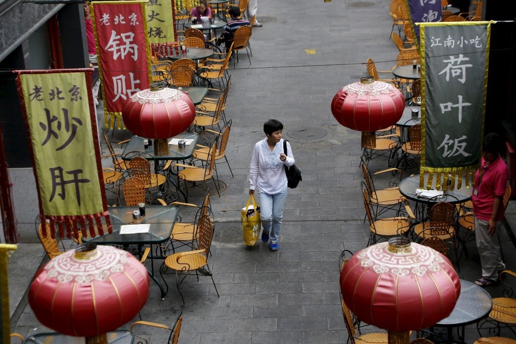 The merger of Dianping and Meituan will create a dominant player in services such as finding deals at restaurants and booking cinema tickets through smartphones. Photo: Reuters
