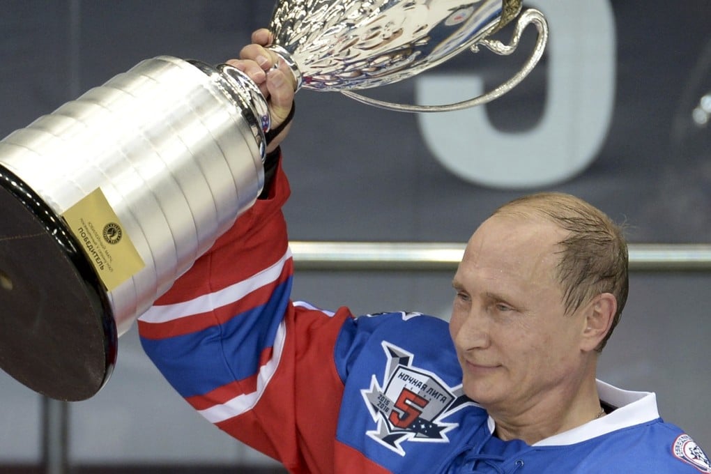 Putin celebrates a glorious win. Photo: AP