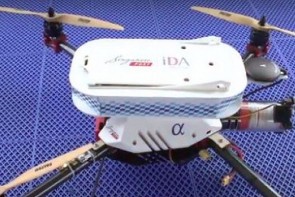 A drone co-developed by SingPost and IDA Labs of the Infocomm Development Authority of Singapore (IDA) made the 2km journey in five minutes. Photo: SCMP Pictures
