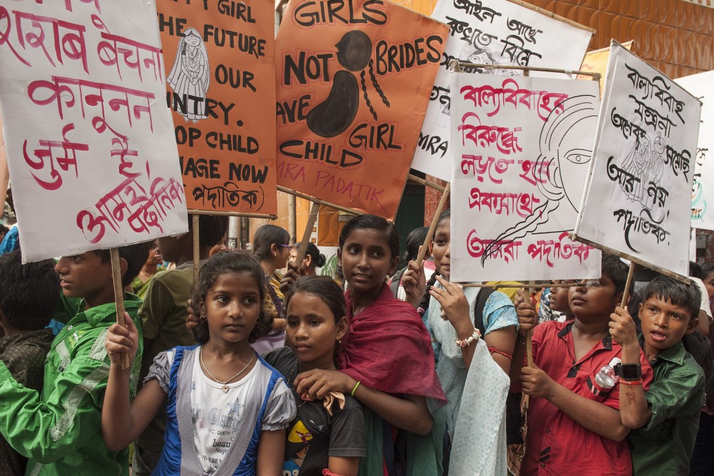 Children of sex workers take part in a rally in Calcutta to raise awareness against child marriage. Every year, at least 15 million girls under 18 get married. Photo: Xinhua