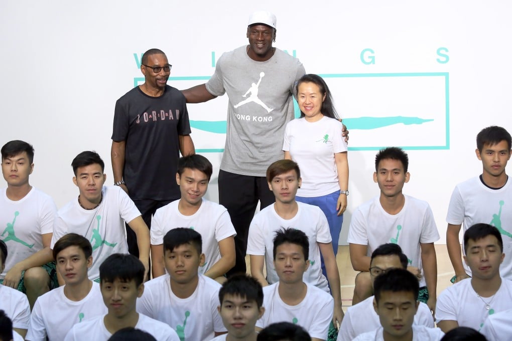 Michael Jordan (back centre) with youngsters he coached in Hong Kong. Photo: Dickson Lee