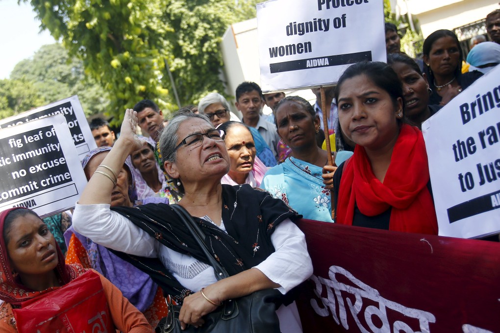 Demonstrators from the All India Democratic Women's Association (AIDWA) shout slogans and hold placards during a protest outside Saudi Arabia's embassy in New Delhi. Photo: Reuters