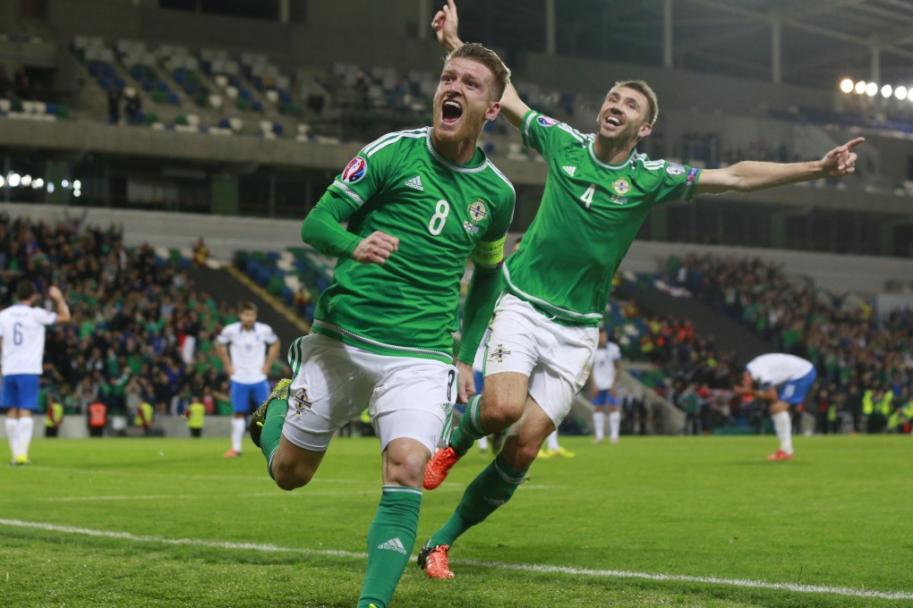 Northern Ireland skipper Steven Davis scored twice to secure his country's passage to France next year. Photo: Reuters