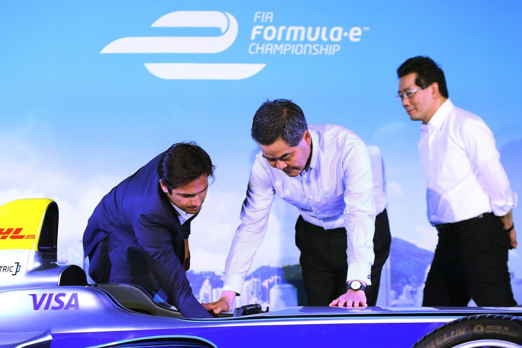 Nelson Piquet Jnr with CY Leung and Secretary for Commerce and Economic Development Gregory So Kam-leung. Photos: Edmond So