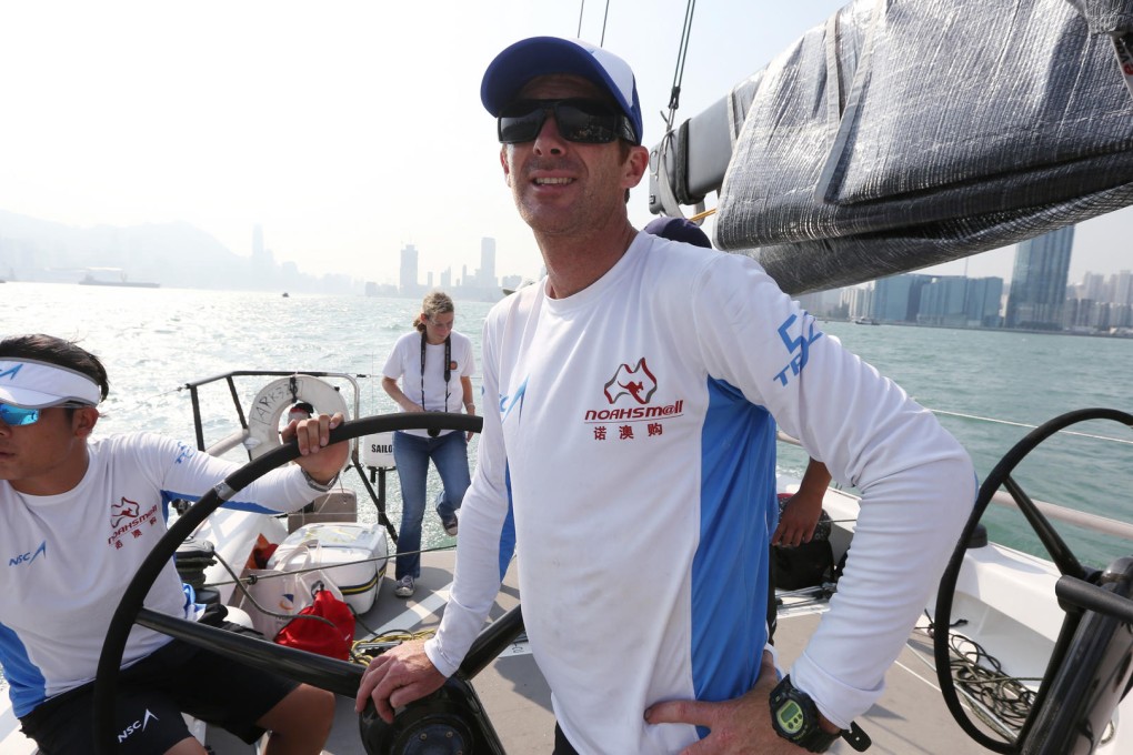 Coach Robert Hielkema  (centre) has high hopes for the fledgling crew of Ark323. Photo: Nora Tam
