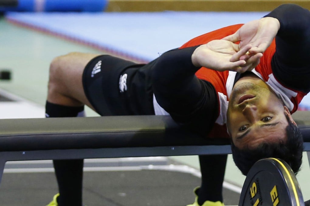 Centre Craig Wing gets in some weight training ahead of becoming Japan’s oldest Rugby World Cup debutant – at age 35 years and 289 days – when the Brave Blossoms play the USA this weekend. Photos: Reuters