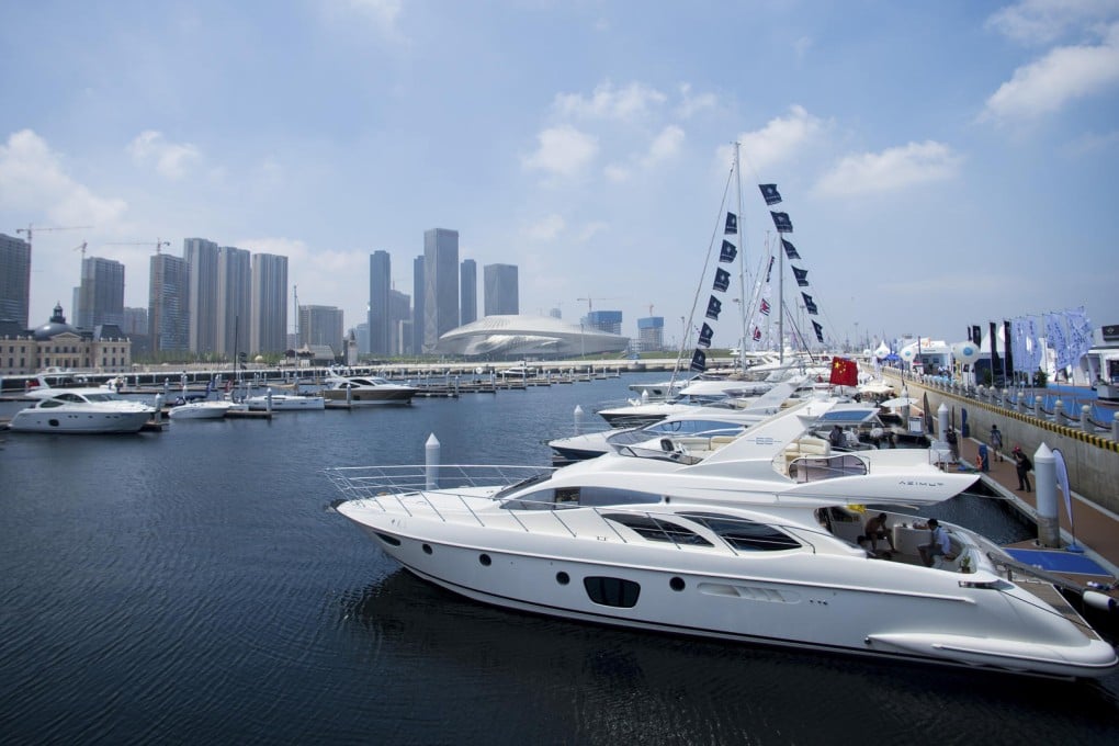 Luxury yachts berthed at a port in Dalian, Liaoning province. China's yacht market is estimated to be worth about 8 billion yuan. Photo: AFP