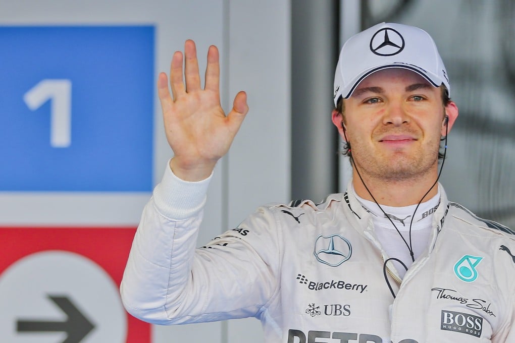 Nico Rosberg of Germany waves to the crowd after taking pole position for Sunday's Russian Grand Prix. Photo: EPA