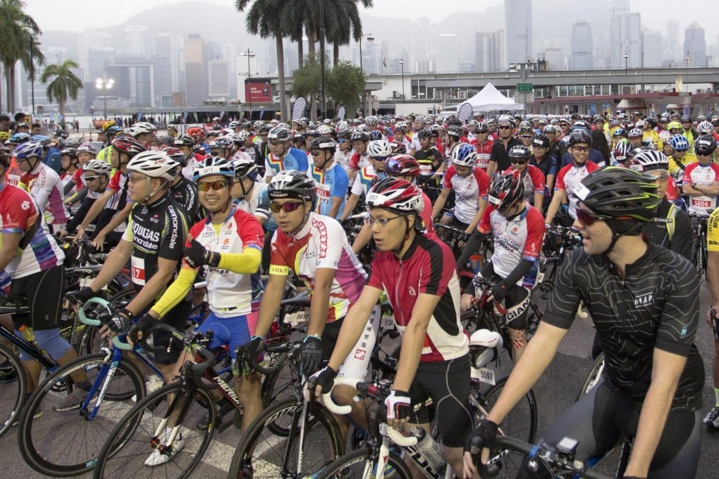 Riders line up at the start of the Cyclothon 35km race in Tsim Sha Tsui on Sunday. Photo: Reuters