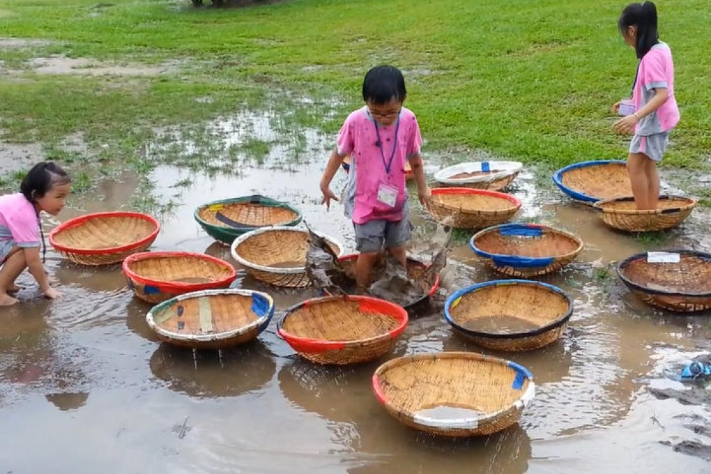 Outdoor fun in a muddy Yuen Long park.