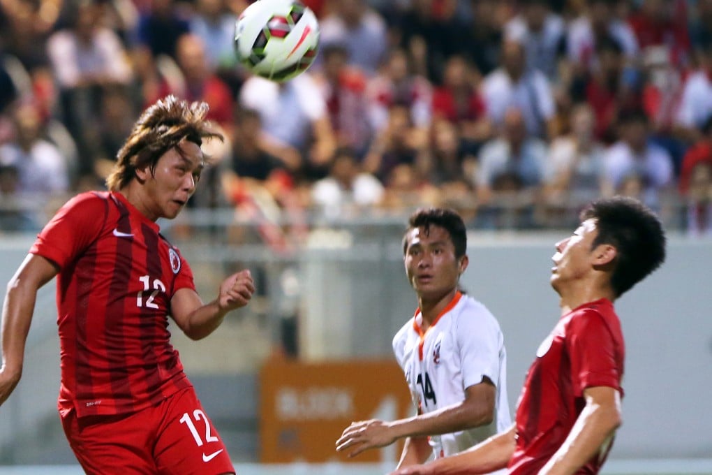 Lo Kwan-yee goes up for a header for Hong Kong against Bhutan in their World Cup qualifying game in group C at Mong Kok Stadium in June. Photos: K.Y. Cheng