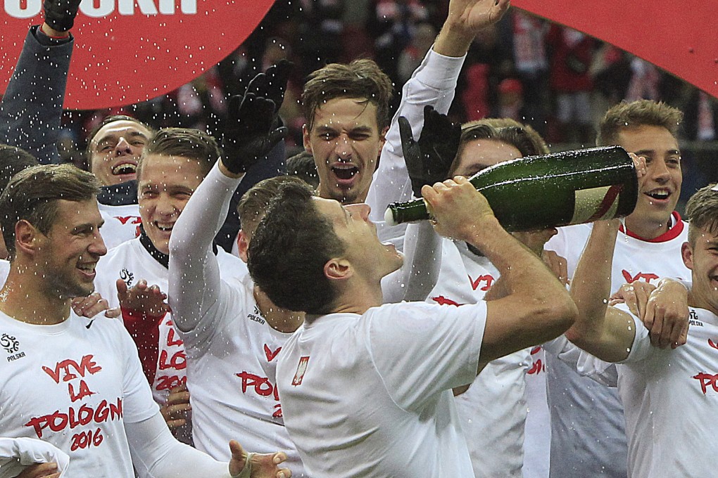 Poland celebrate qualification. Photo: AP